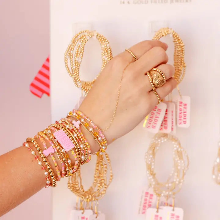 Beaded Blondes Pink Cross Bracelet On Gold