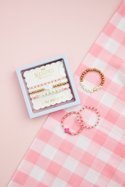 MUD PIE WHITE CROSS BEADED BRACELETS