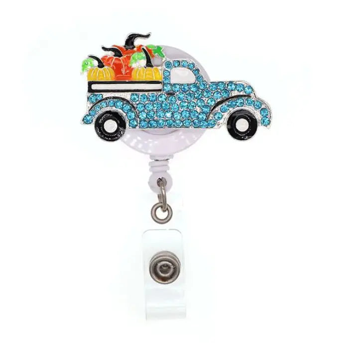 Outside The Box, LLC Fall Pumpkin Truck Sparkle and Shine Rhinestone Badge Reel