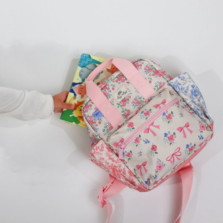 Itzy Ritzy Bitzy Backpack-Ribbons + Roses