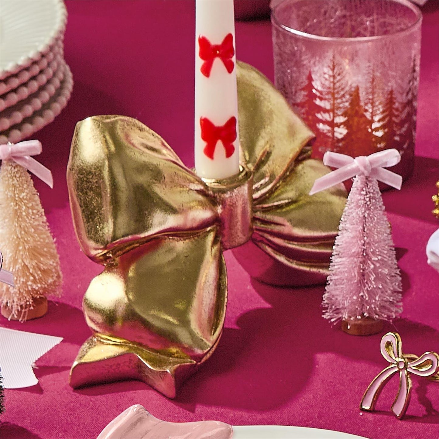 TWO'S COMPANY LARGE GOLD BOW TAPER CANDLEHOLDER