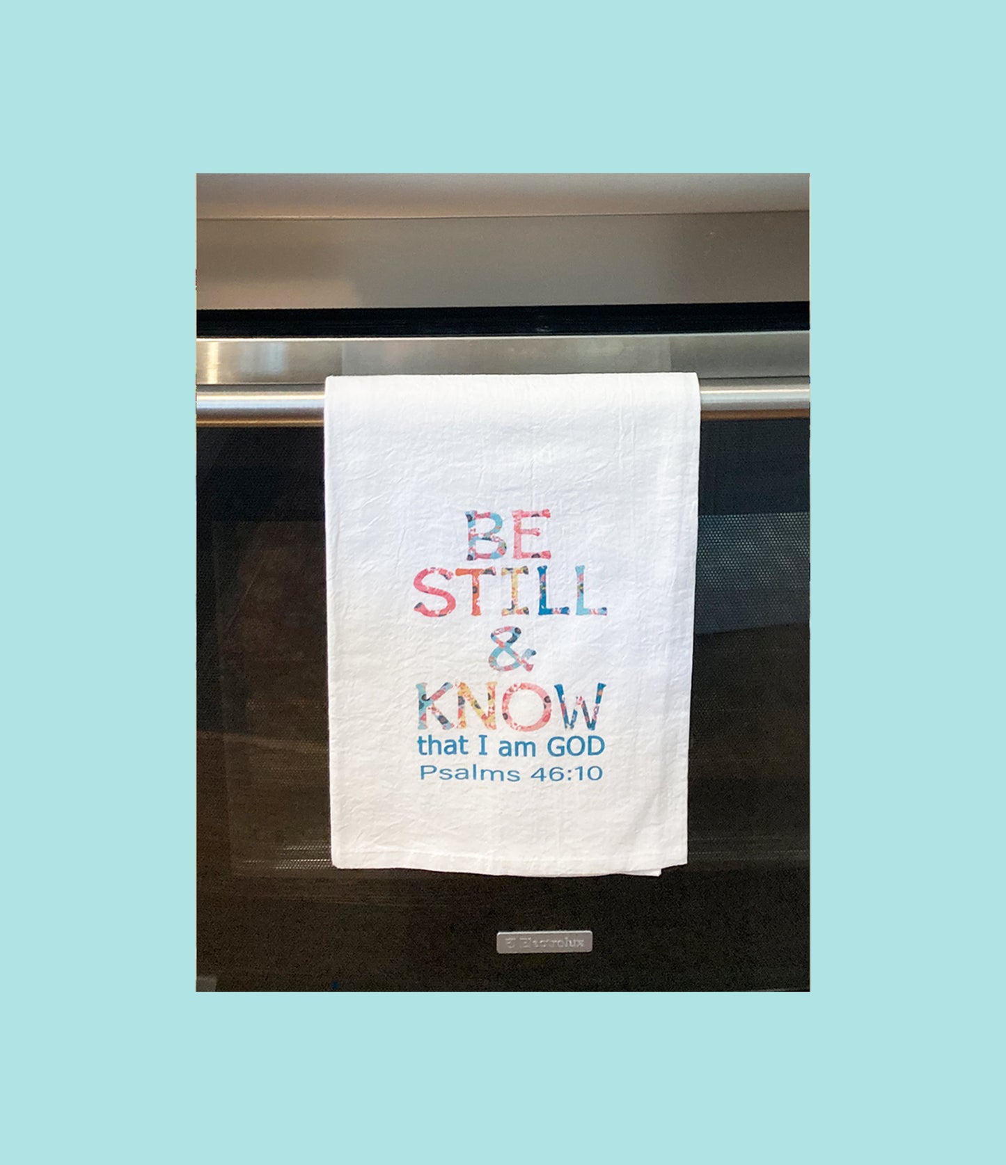 Standing on the Word Tea Towel Flowered Letters with verse: Psalms 46:10 Be still & know