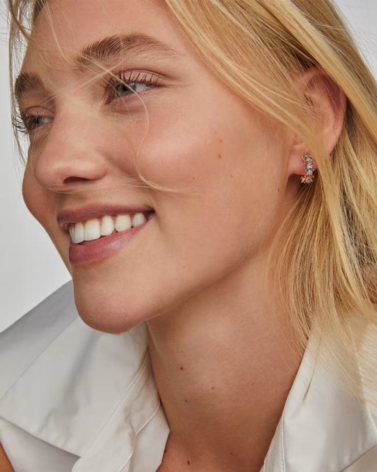 KENDRA SCOTT CAILIN CRYSTAL HUGGIE EARRINGS GOLD BLUE VIOLET CRYSTAL