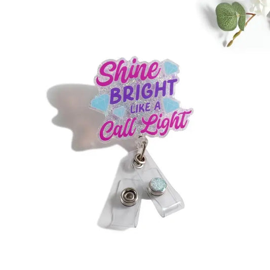 Outside the Box, LLC Glitterific Badge Reel Shine Bright Like A Call Light