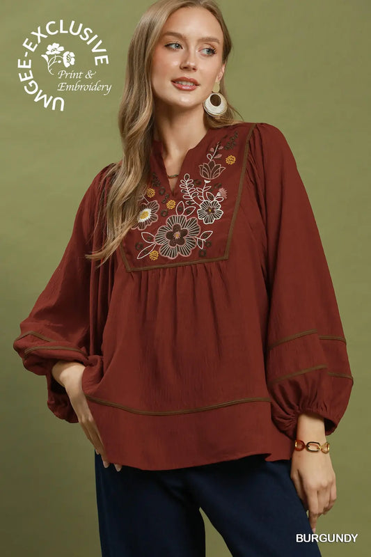 Umgee Floral Embroidered Split Neck Babydoll Blouse-Burgundy